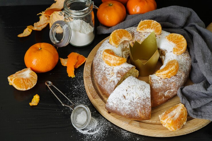 Free Photo epiphany day desserts with orange and crown