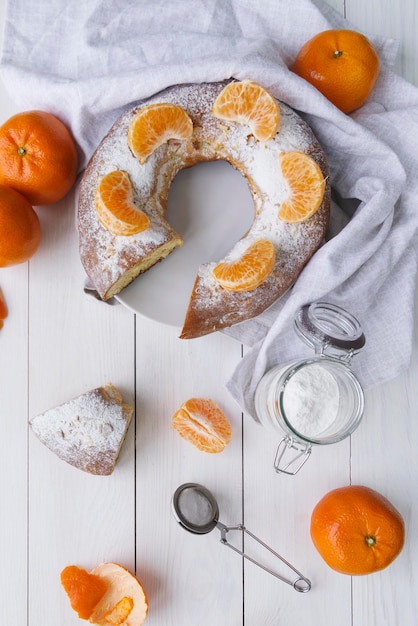 Free photo epiphany day desserts with orange and sugar