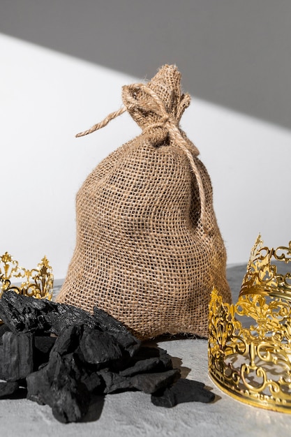 Epiphany day sack of coal with gold crowns