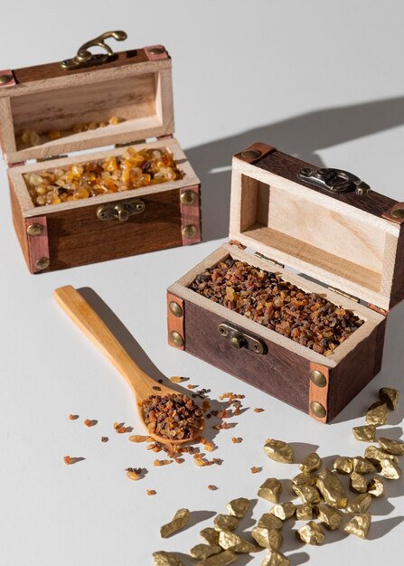 Epiphany day treasure chests with raisins and wooden spoon