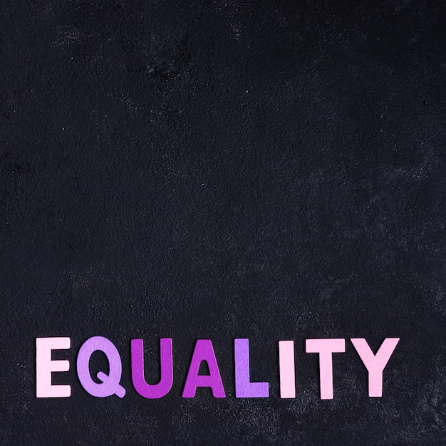 Free photo equality concept and black copy space background