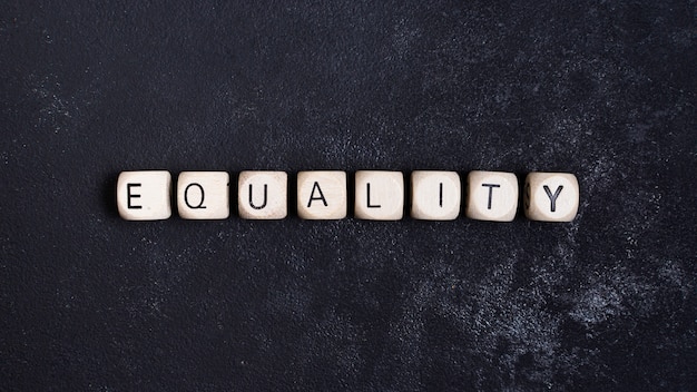 Equality concept written in wooden cubes