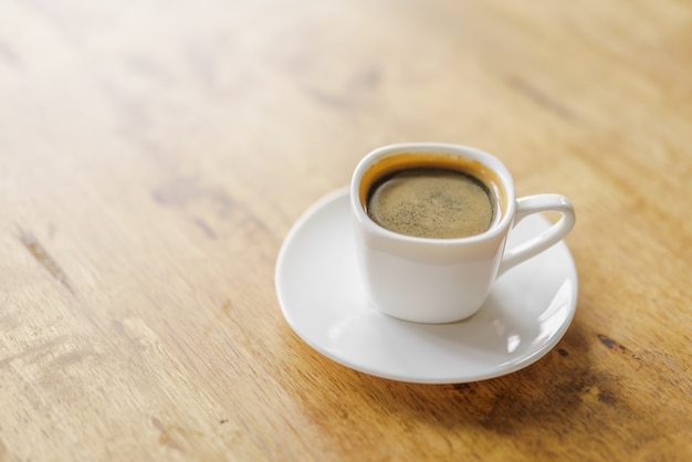 Espresso coffee cup on wood table