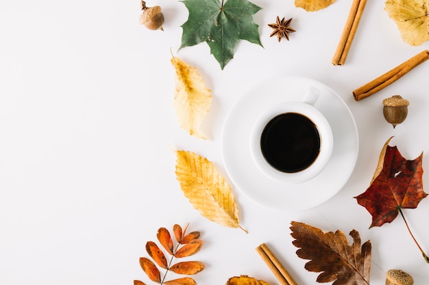 Free photo espresso in composition with autumnal decor