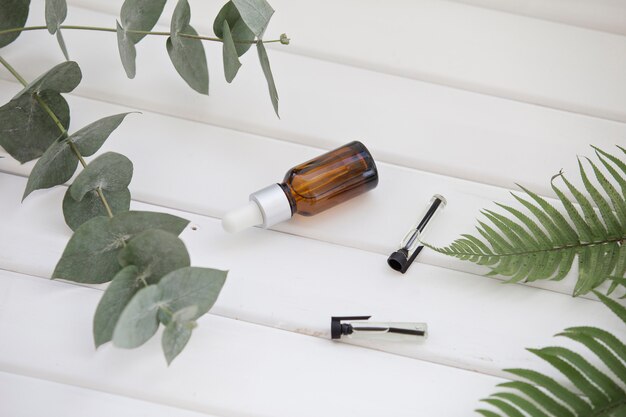 Essential oil bottles isolated on white.