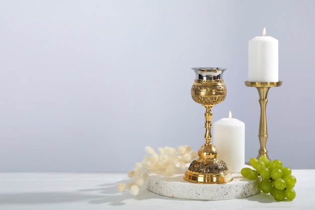 Eucharist celebration with chalice and grapes