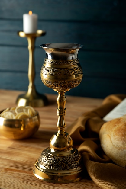 Eucharist with wine chalice and candle