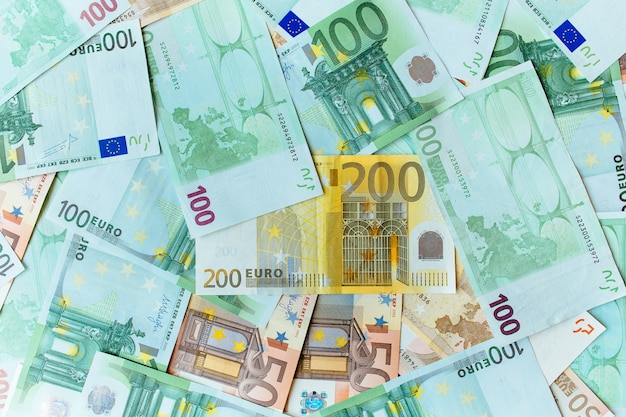 Free Photo euro cash background. many banknotes of euro currency