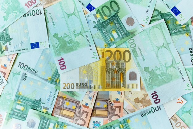 Euro cash background. Many banknotes of Euro currency