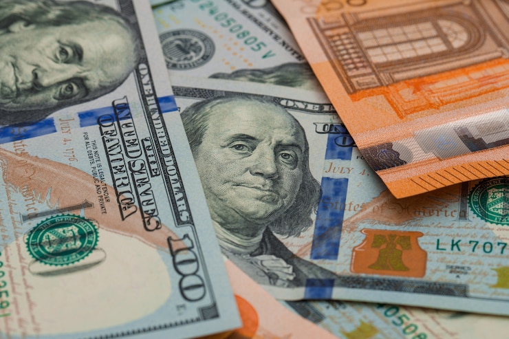Free Photo euro and dollar bills