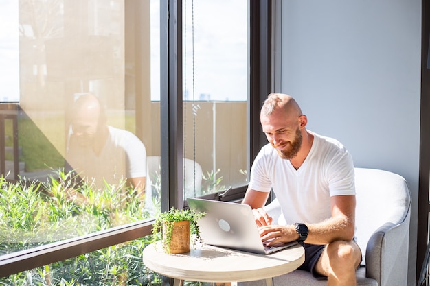 European business man in white shirt does distance work