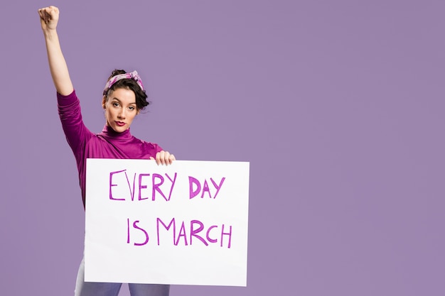 Free photo every day is march cardboard with woman standing