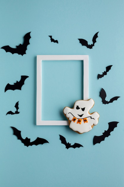 Evil halloween ghost with bats and frame