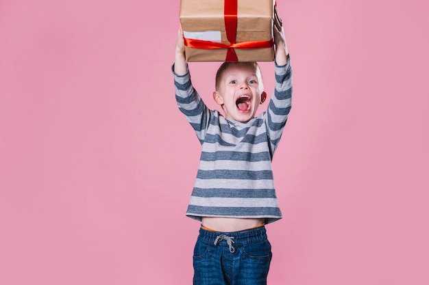 Excited boy with present