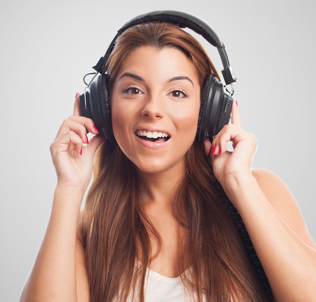 Excited girl in headphones