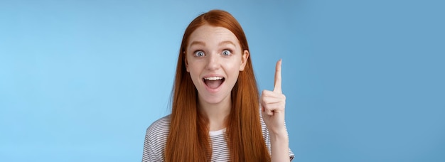 Free photo excited goodlooking cheerful ginger girlfriend add idea conversation raise index finger eureka