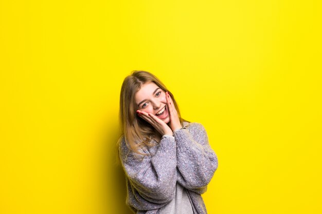 Excited of joy. Teen girl feeling ecstatic of surprise shouting isolated