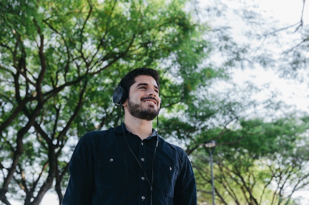 Excited man listening to music