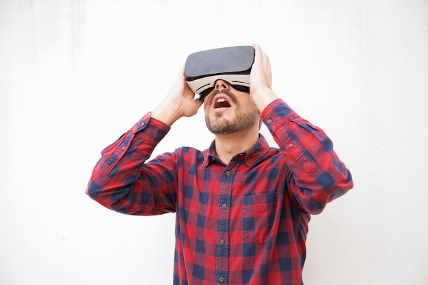 Excited man in VR headset