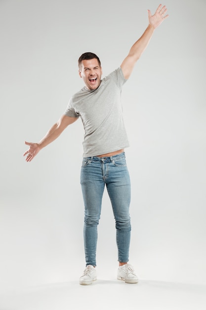 Excited screaming young man