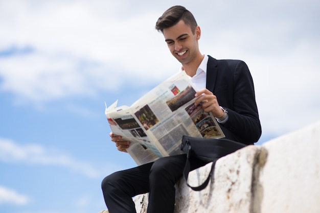 Free photo excited student always knowing actual news