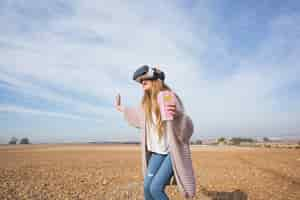 Free photo excited woman in goggles enjoying movie