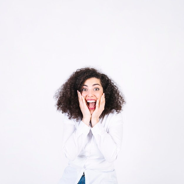 Excited woman looking at camera