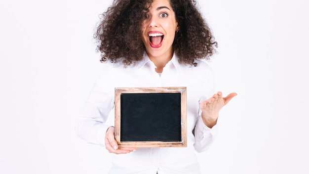 Free photo excited woman with blackboard