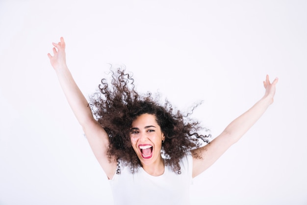 Excited woman with curly hair