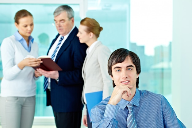 Free photo executive smiling on workplace