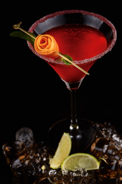 Exotic cocktail with rose closeup