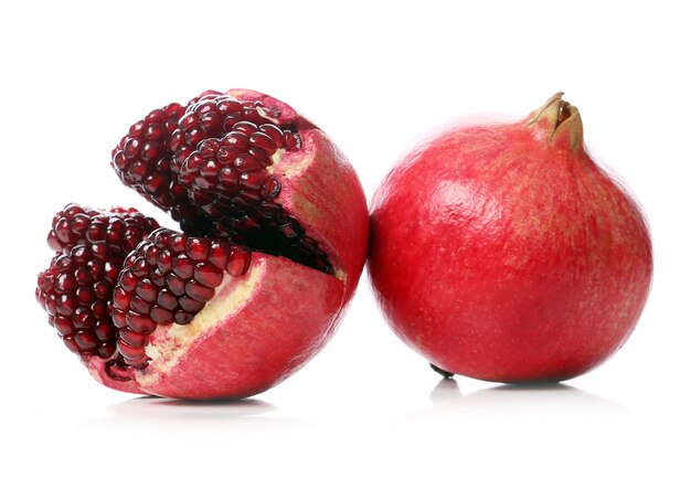 Exotic and delicious pomegranate on white background