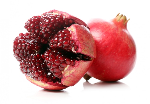 Exotic and delicious pomegranate on white background