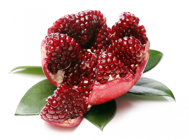 Exotic and delicious pomegranate on white background