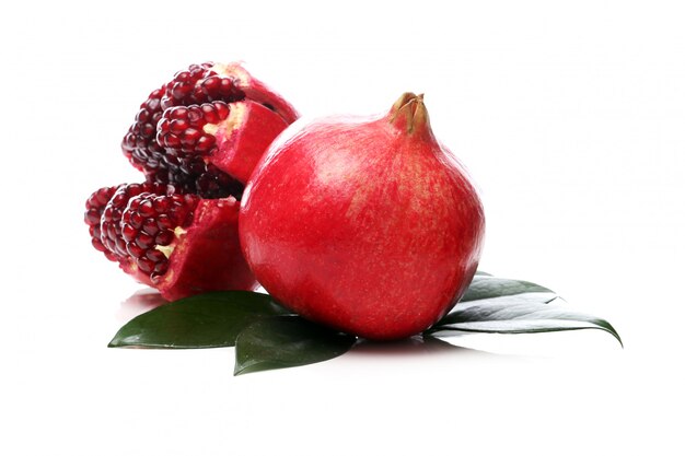 Exotic and delicious pomegranate on white background