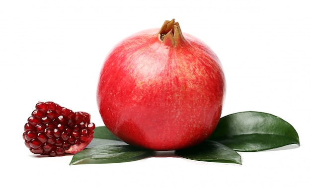 Exotic and delicious pomegranate on white background