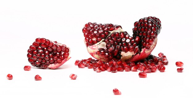 Exotic and delicious pomegranate on white background