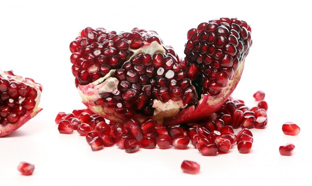 Exotic and delicious pomegranate on white background