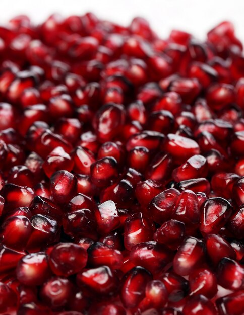 Exotic and delicious pomegranate on white background