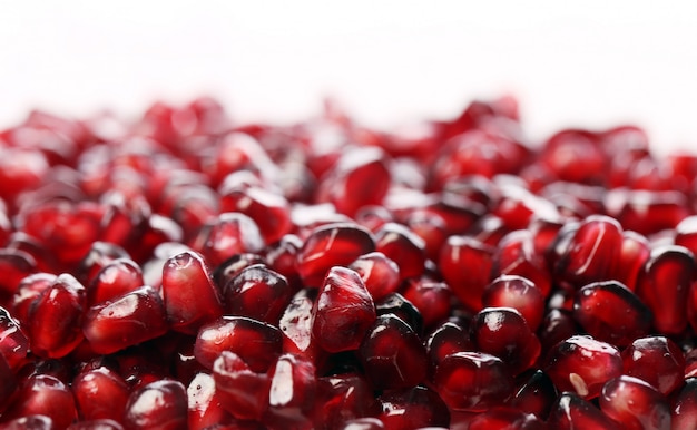 Exotic and delicious pomegranate on white background