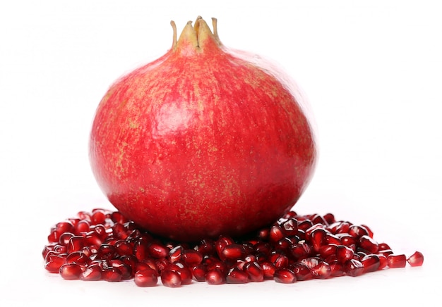 Exotic and delicious pomegranate on white background