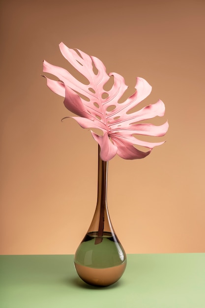 Exotic pink leaf in vase still life