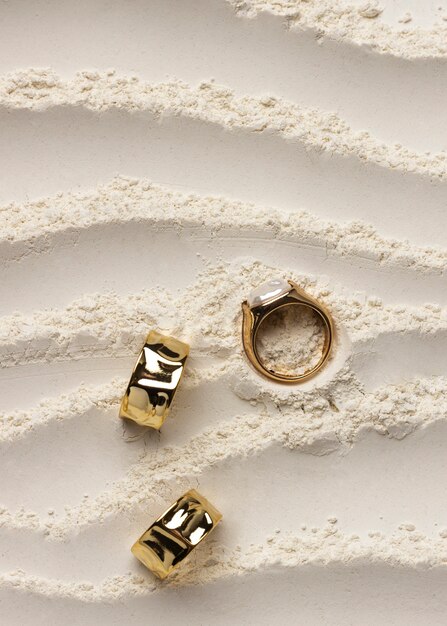 Expensive golden ring with white powder background