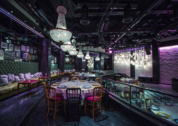 Expensive restaurant interior view with colorful illuminating