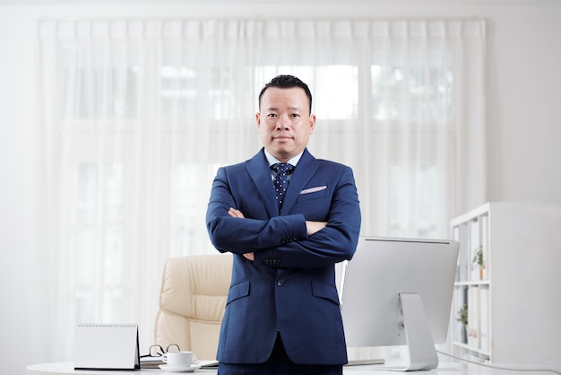 Free photo experienced asian businessman