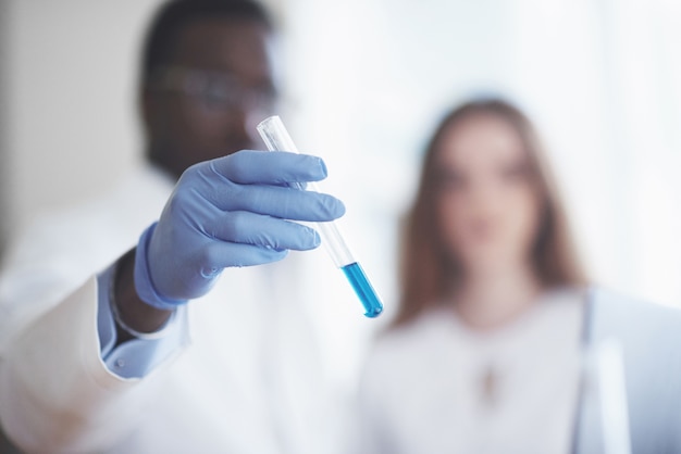 Experiments in the chemical laboratory. an experiment was carried out in a laboratory in transparent flasks.