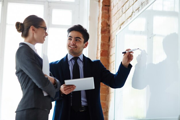 Explaining data on whiteboard