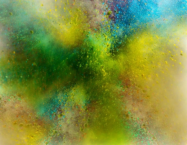 Explosion of colored powder on white background