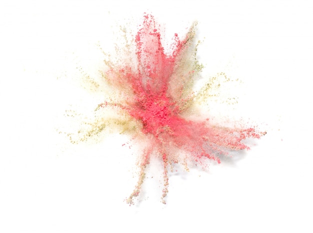 Explosion of colored powder on white background