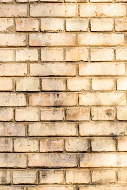 Exposed dirty brick wall